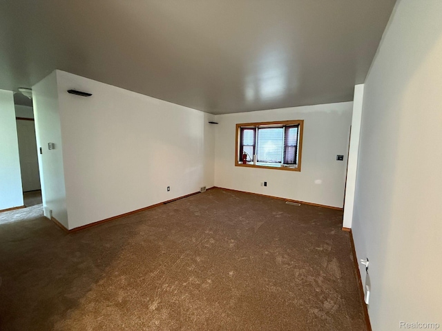 13420 Couwlier Ave, Warren, MI 48089 - unfurnished room featuring dark carpet and baseboards