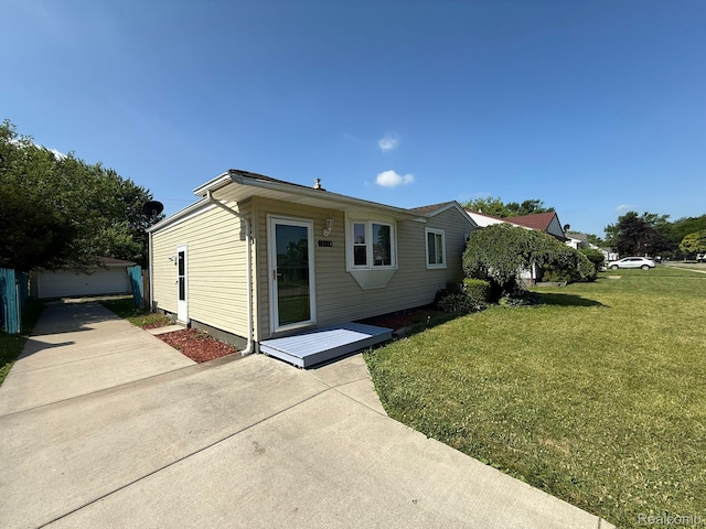 13420 Couwlier Ave, Warren, MI 48089 - back of house featuring a lawn