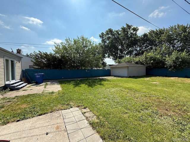 13420 Couwlier Ave, Warren, MI 48089 - view of yard with a garage and an outbuilding