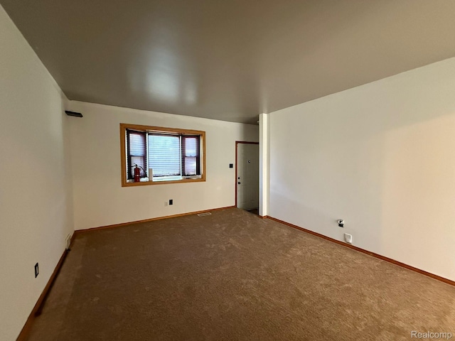 13420 Couwlier Ave, Warren, MI 48089 - carpeted empty room with baseboards