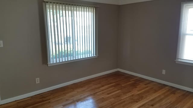 25933 Norfolk St, Inkster, MI 48141 - unfurnished room with baseboards and wood finished floors