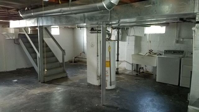 25933 Norfolk St, Inkster, MI 48141 - basement featuring water heater, separate washer and dryer, and stairway