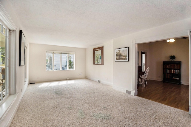 722 Conger St, South Haven, MI 49090 - empty room with carpet floors and a textured ceiling
