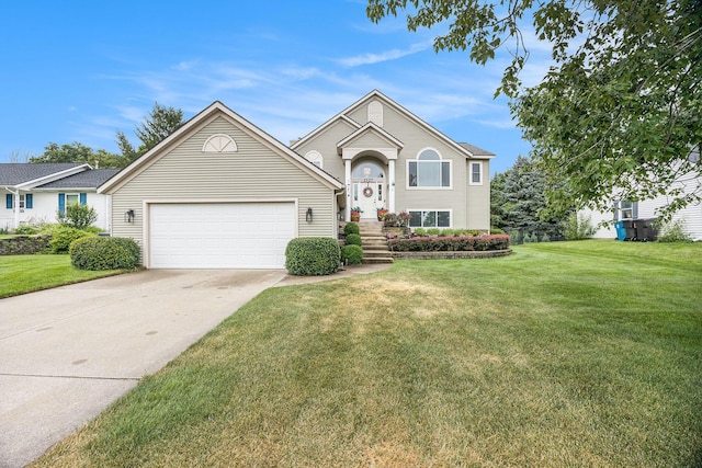 1527 Wiersma Dr, Zeeland, MI 49464 - view of front of property with concrete driveway, an attached garage, and a front lawn