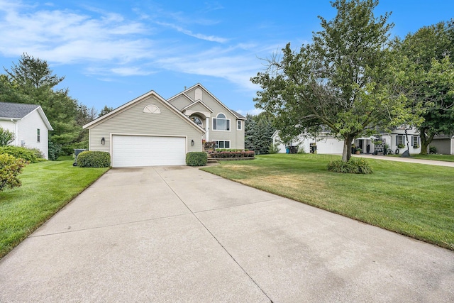 1527 Wiersma Dr, Zeeland, MI 49464 - traditional home with concrete driveway, a front yard, and an attached garage