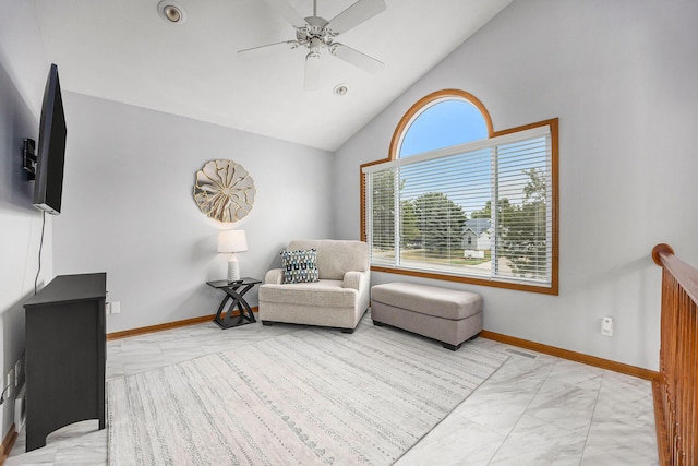 1527 Wiersma Dr, Zeeland, MI 49464 - living area with light marble finish floors, a ceiling fan, and high vaulted ceiling