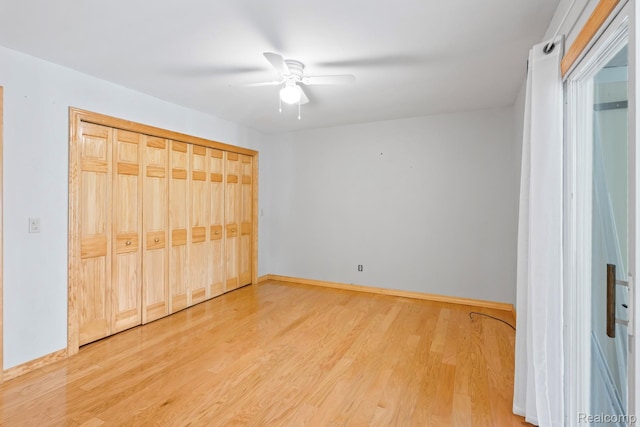609 N Wickshire Ln, Durand, MI 48429 - unfurnished bedroom featuring light wood finished floors and a ceiling fan
