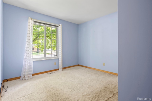 609 N Wickshire Ln, Durand, MI 48429 - unfurnished room featuring carpet floors and baseboards