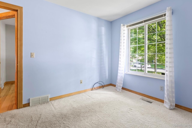 609 N Wickshire Ln, Durand, MI 48429 - carpeted spare room with baseboards