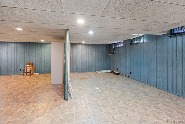 609 N Wickshire Ln, Durand, MI 48429 - finished below grade area with recessed lighting, wood walls, and a drop ceiling