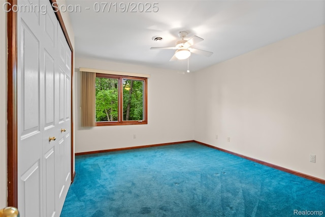 260 Forest Crest Dr, Commerce Twp, MI 48390 - unfurnished bedroom featuring carpet flooring, a closet, and a ceiling fan