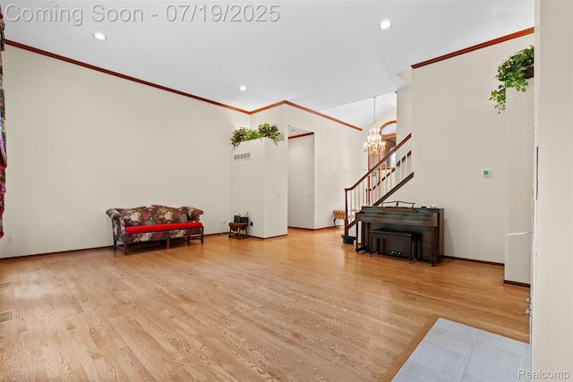 260 Forest Crest Dr, Commerce Twp, MI 48390 - living area with crown molding, recessed lighting, wood finished floors, and a chandelier