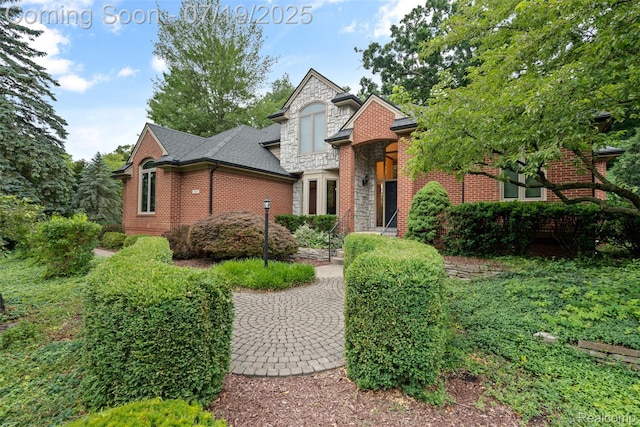 260 Forest Crest Dr, Commerce Twp, MI 48390 - view of front of home with stone siding and brick siding