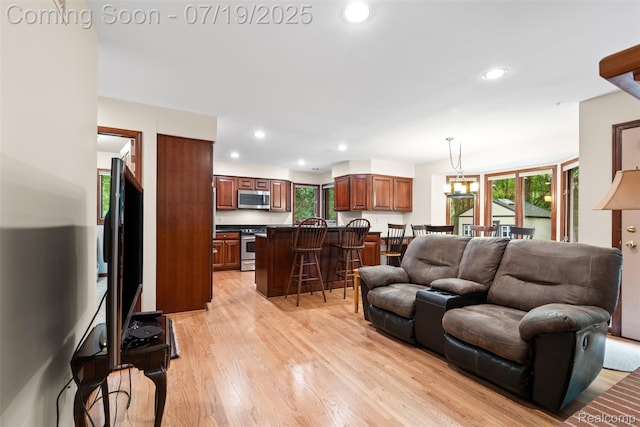 260 Forest Crest Dr, Commerce Twp, MI 48390 - living room featuring light wood-type flooring and recessed lighting