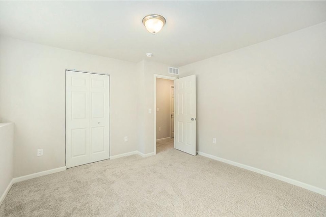 5487 Mammoth Dr SE, Caledonia, MI 49316 - unfurnished bedroom featuring carpet flooring and a closet