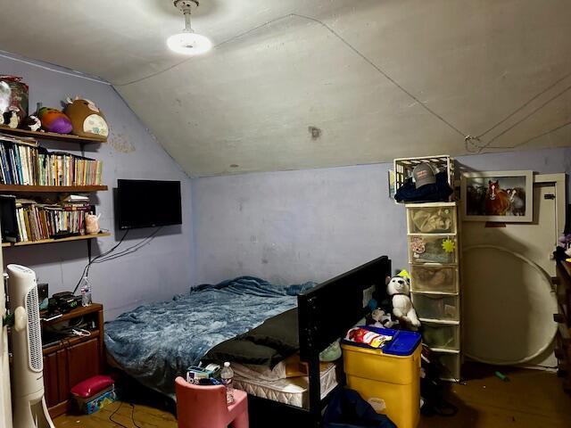 8210 E Pierce Rd, Hesperia, MI 49421 - bedroom featuring lofted ceiling