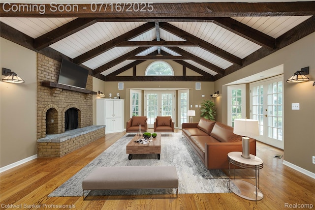 56 Oxford Rd, Grosse Pointe Shores, MI 48236 - living room with a brick fireplace, beamed ceiling, wood finished floors, and high vaulted ceiling