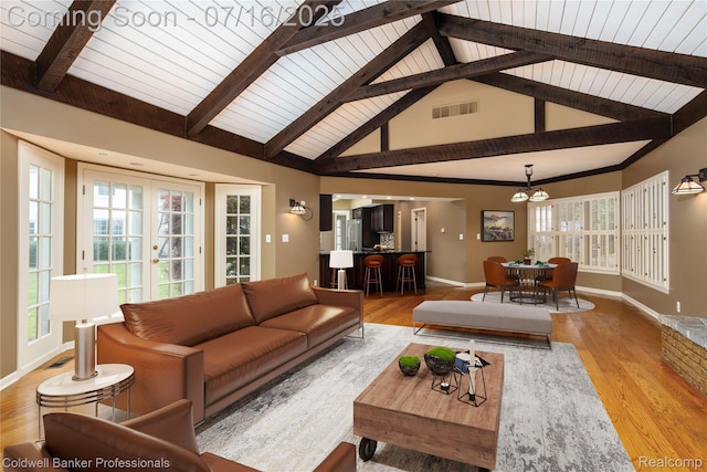 56 Oxford Rd, Grosse Pointe Shores, MI 48236 - living room with wood finished floors and a chandelier