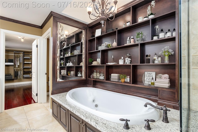 56 Oxford Rd, Grosse Pointe Shores, MI 48236 - bathroom with a chandelier, crown molding, a jetted tub, and tile patterned floors