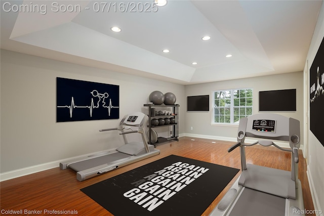 56 Oxford Rd, Grosse Pointe Shores, MI 48236 - exercise area with a tray ceiling, wood finished floors, and recessed lighting