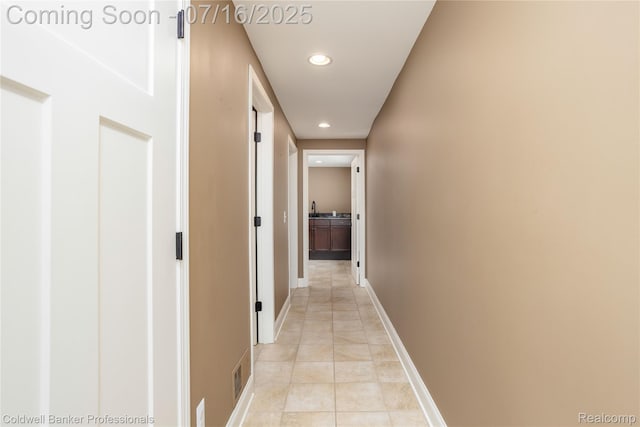56 Oxford Rd, Grosse Pointe Shores, MI 48236 - hallway with recessed lighting and light tile patterned floors