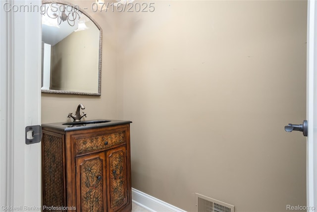 56 Oxford Rd, Grosse Pointe Shores, MI 48236 - bathroom with vanity and baseboards