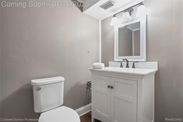 56 Oxford Rd, Grosse Pointe Shores, MI 48236 - half bathroom featuring toilet and vanity
