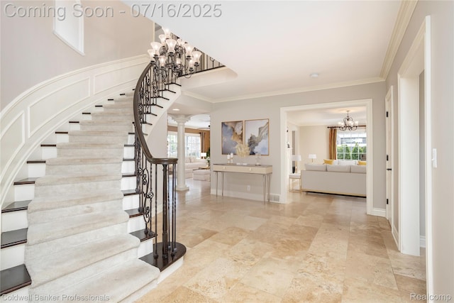 56 Oxford Rd, Grosse Pointe Shores, MI 48236 - stairway featuring a chandelier, ornate columns, and ornamental molding