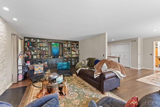 579 Budlong St, Adrian, MI 49221 - living room featuring wood finished floors and recessed lighting