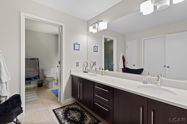 579 Budlong St, Adrian, MI 49221 - full bath featuring double vanity and a shower with shower door