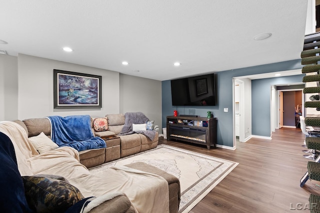 579 Budlong St, Adrian, MI 49221 - living room with wood finished floors and recessed lighting