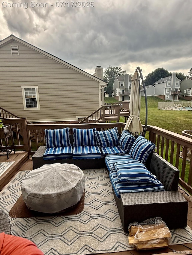 31199 Columbia Dr, Novi, MI 48377 - wooden deck featuring a yard and a residential view