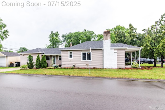 5758 N Parent St, Westland, MI 48185 - ranch-style house with a front lawn and a chimney