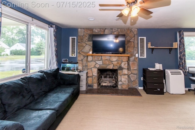 5758 N Parent St, Westland, MI 48185 - living room with ceiling fan and a stone fireplace