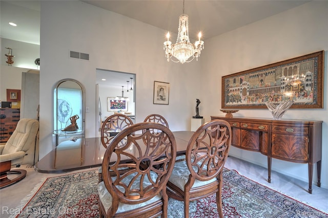 7071 Deerwood Trl Unit 28, West Bloomfield, MI 48323 - dining room featuring a chandelier