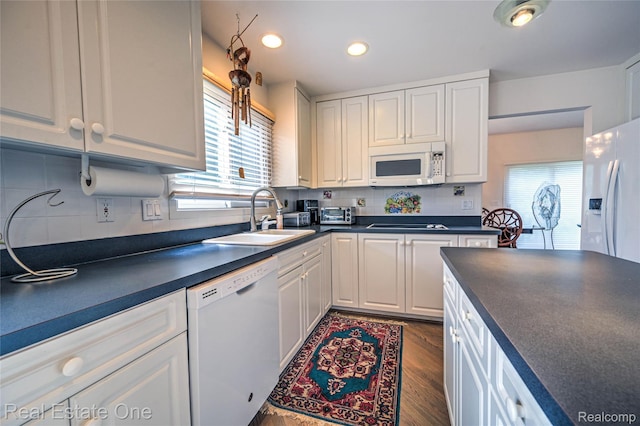 7071 Deerwood Trl Unit 28, West Bloomfield, MI 48323 - kitchen with white appliances, dark countertops, white cabinetry, and recessed lighting