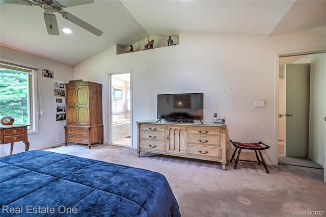 7071 Deerwood Trl Unit 28, West Bloomfield, MI 48323 - carpeted bedroom featuring vaulted ceiling, ensuite bath, and ceiling fan