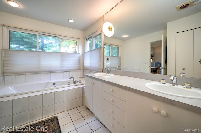 7071 Deerwood Trl Unit 28, West Bloomfield, MI 48323 - full bathroom with tile patterned floors, double vanity, and a bath