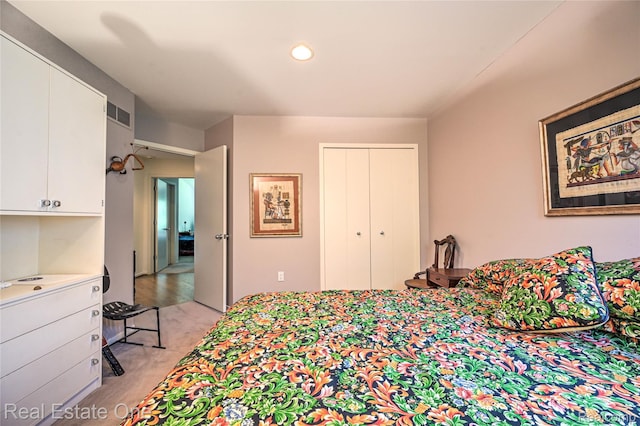 7071 Deerwood Trl Unit 28, West Bloomfield, MI 48323 - bedroom featuring light colored carpet and a closet