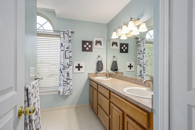 7269 Wellington Ln, Ypsilanti, MI 48197 - full bath with double vanity and healthy amount of natural light