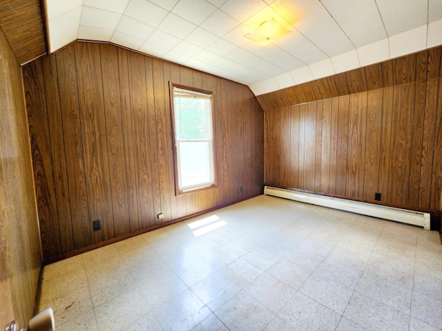 214 S Gorham St, Jackson, MI 49203 - bonus room featuring a baseboard radiator, lofted ceiling, tile patterned floors, and wooden walls