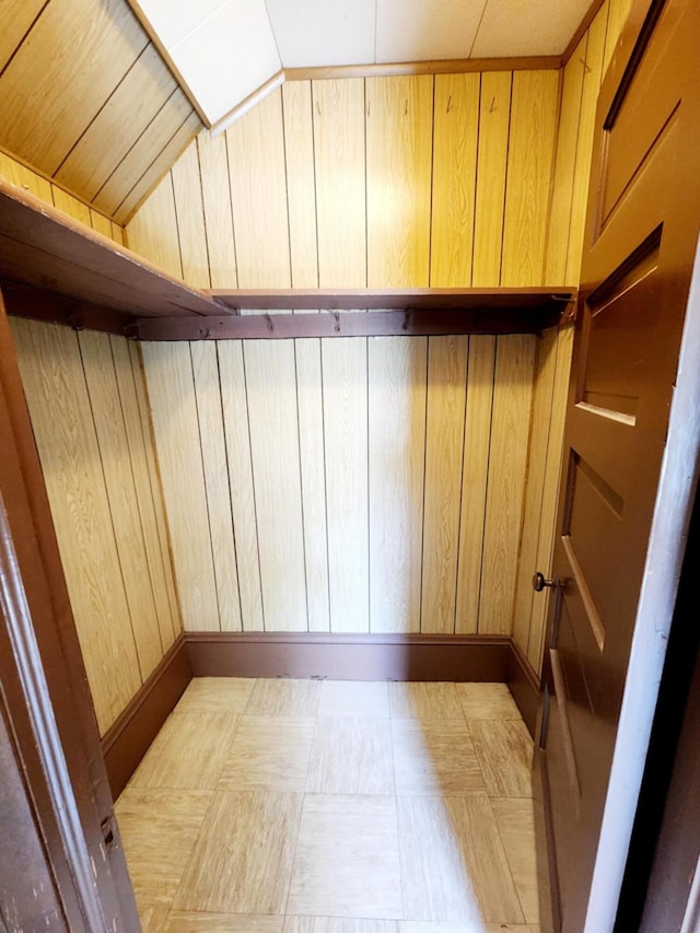 214 S Gorham St, Jackson, MI 49203 - detailed view of wood walls and tile patterned floors