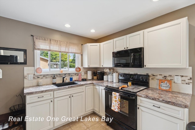 2270 Anderson Rd, Saginaw, MI 48603 - kitchen featuring black appliances, tasteful backsplash, white cabinetry, recessed lighting, and light tile patterned floors