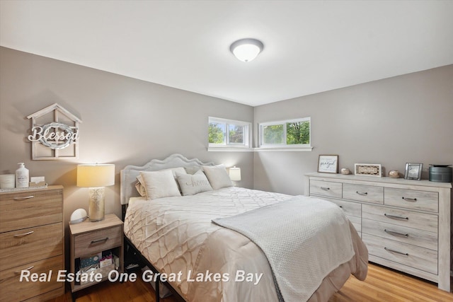 2270 Anderson Rd, Saginaw, MI 48603 - bedroom featuring wood finished floors