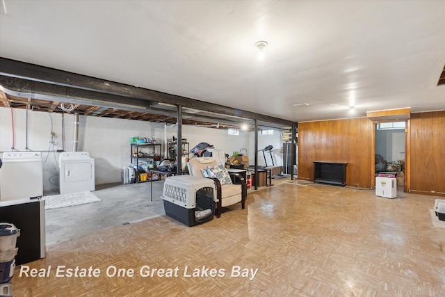 2270 Anderson Rd, Saginaw, MI 48603 - finished below grade area featuring separate washer and dryer and wood walls