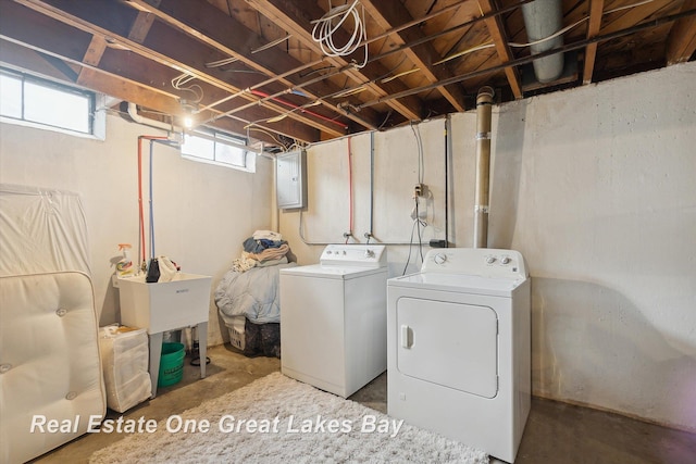 2270 Anderson Rd, Saginaw, MI 48603 - washroom featuring separate washer and dryer and electric panel