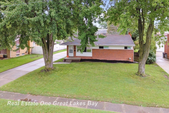 2270 Anderson Rd, Saginaw, MI 48603 - single story home featuring brick siding and concrete driveway
