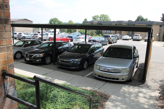 1265 S Maple Rd Unit 207, Ann Arbor, MI 48103 - view of uncovered parking lot