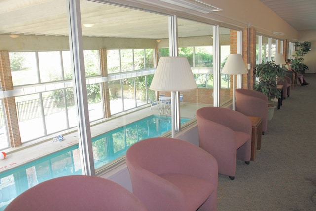 1265 S Maple Rd Unit 207, Ann Arbor, MI 48103 - sunroom featuring plenty of natural light