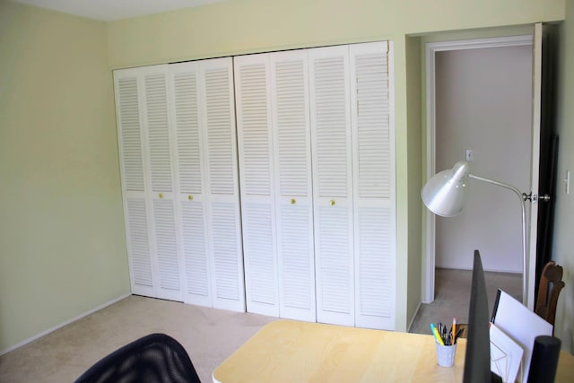 1265 S Maple Rd Unit 207, Ann Arbor, MI 48103 - carpeted bedroom with a closet and baseboards